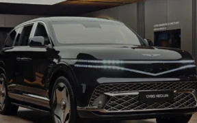 Sonoran Navy Genesis GV90 Neolun electric SUV shown in a three-quarter front view at the Genesis Suji exhibition.