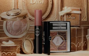 Dior Holiday 2026 Cinnamon Glaze makeup collection arranged in a gold gingerbread-inspired holiday set.